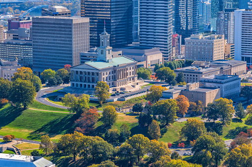 Aerial view of the beautiful Tennessee State Capitol Building sitting atop a hill in downtown Nashville, Tennessee, completed in 1859, and is one of the state's best examples of \