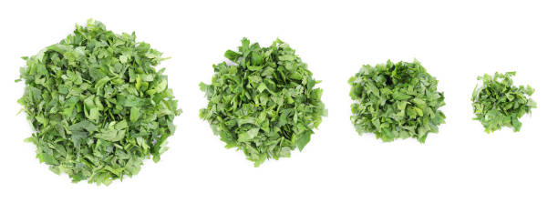 istock Set with heaps of cut parsley isolated on white, top view 1817411954