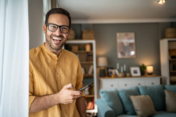 istock This is a good news I read on my mobile phone 1817449663
