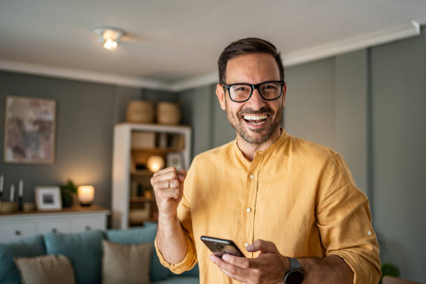 istock This is a good news I read on my mobile phone 1817451427
