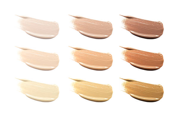 istock Different shades of liquid skin foundation on white background, top view. Set with samples of makeup product 1817474647