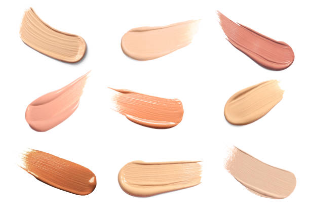 istock Foundation of different textures and shades for various skin types isolated on white. Set with samples of makeup product 1817475691