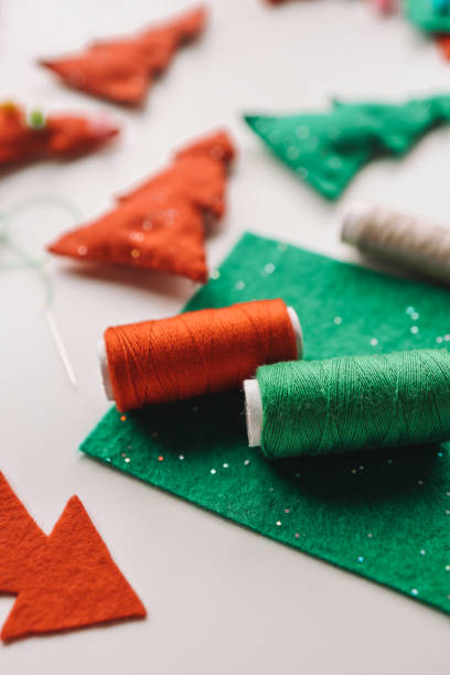 istock Process of hand made soft toys sewing with felt and needle for Christmas tree decoration 1817476209