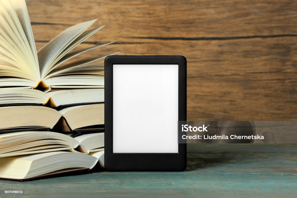 Book Reader Back Portable Ebook Reader And Open Hardcover Books On Wooden Rustic Table ...