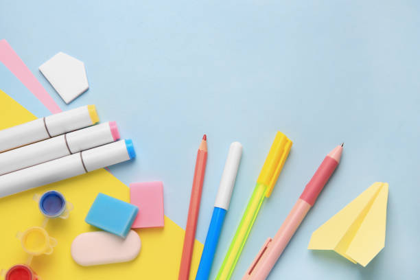 istock Flat lay composition with different school stationery on light blue background. Back to school 1817500057