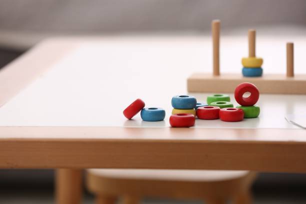 istock Stacking and counting game on table indoors, space for text. Educational toy for motor skills development 1817500166
