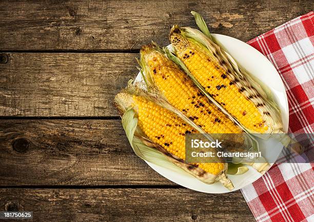 Grilled Corn Cobs On White Plate Vintage Wood As Background Stock Photo - Download Image Now
