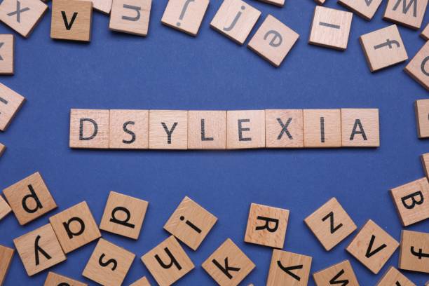 istock Word Dyslexia made with shuffled cubes on blue background, flat lay 1817508578