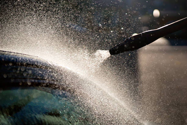 istock high pressure washer used on car 181752329