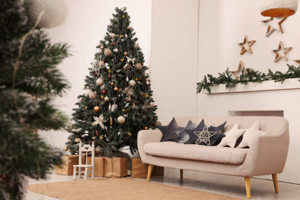 istock Living room interior with Christmas tree and festive decor 1817526677