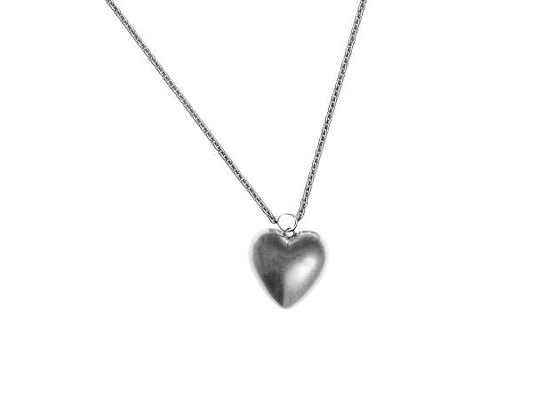 istock Metallic heart shape in chain isolated on white. Close-up. 181754632