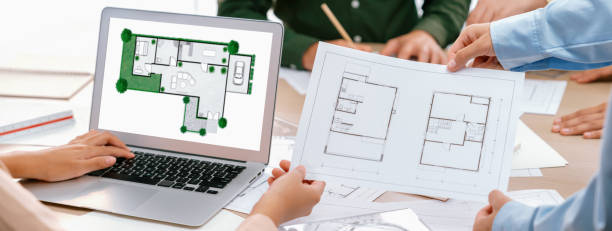 istock Architect decide the blueprint for eco-friendly house. Closeup. Delineation 1817556143