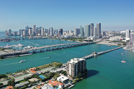 Aerial view of Waterfront residential and office buildings on Intracoastal Waterway and Biscayne Bay on sunny cloudless morning in Miami, Florida.