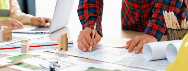 istock Professional architect working with blueprint at meeting. Close up. Delineation. 1817593998