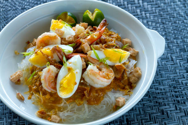 istock Glass Noodles with Teriyaki Sauce, Hard Boiled Egg, Shrimp and Lime 1817606088