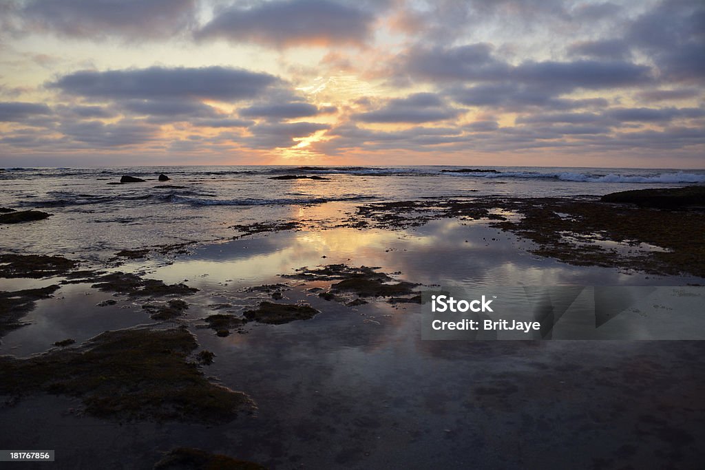 Sunset Reflection Reflection of the sunset in the water Bay of Water Stock Photo