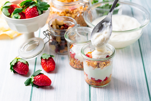 Strawberry, granola and yogurt healthy breakfast parfait