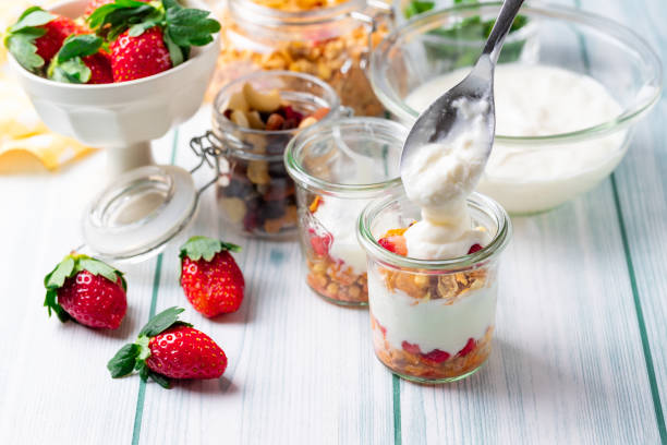 Strawberry, granola and yogurt healthy breakfast parfait stock photo