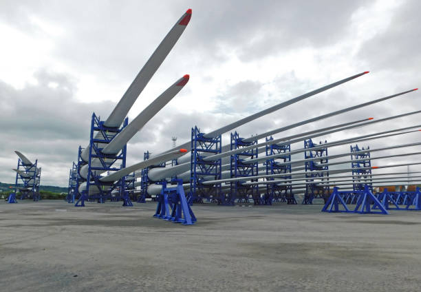 Wind turbine blades stacked for erection at the harbour
