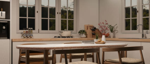 istock Empty space on a dining table in a minimal Scandinavian kitchen with kitchen appliances. 1817815434