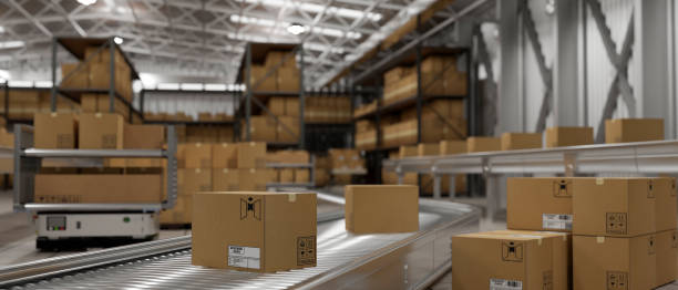istock Retail shipping warehouse with cardboard boxes on a conveyor. cargo freight transportation industry. 1817818262
