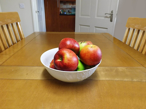 Bowl of Apples on kitchen table
