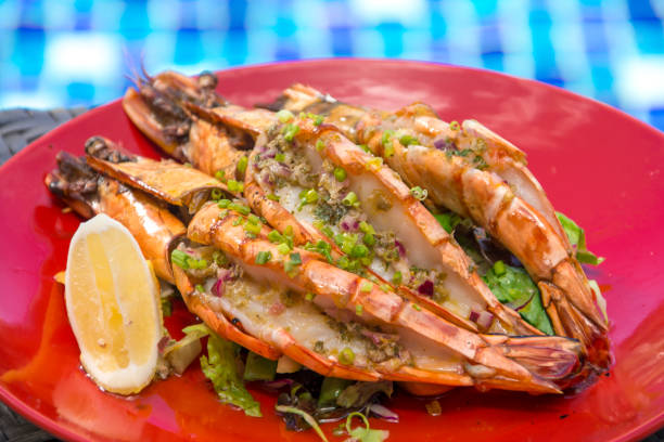 istock Grilled prawns drizzled with garlic butter sauce 1817837272