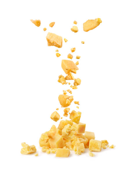istock Parmesan cheese falls on a pile with cheese on a white background 1817854335