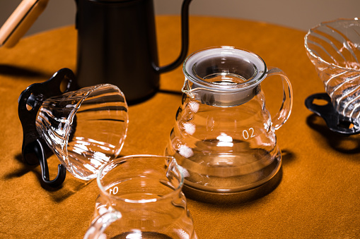 pour over coffee,hand brewed coffee or Dripping Coffee,Coffee set, glass percolator, indoor studio light, close-up