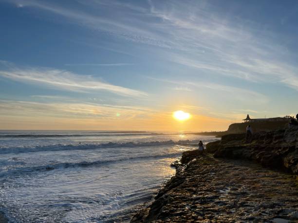 istock beautiful beach at sunset 1817908175