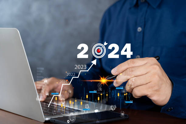 istock Businessman working on digital laptop computer with digital graph chart graphic, positive indicators in 2024, business calculate financial data, Digital marketing, finance. 1817923944