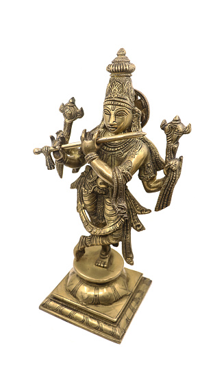 statue of hindu god lord krishna, a vishnu avatar, with multiple hands playing flute with hand signs crafted in gloden brass isolated in a white background