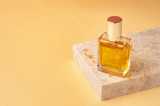 istock Essential oil glass bottle on beige background. 1817944457