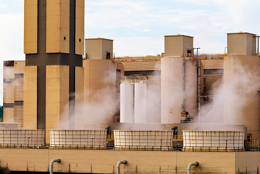 Lorton, Virginia, USA - October 15, 2021: Steam rises from the Covanta Energy Resource Recovery Facility at Fairfax County’s I-95 Landfill Complex.