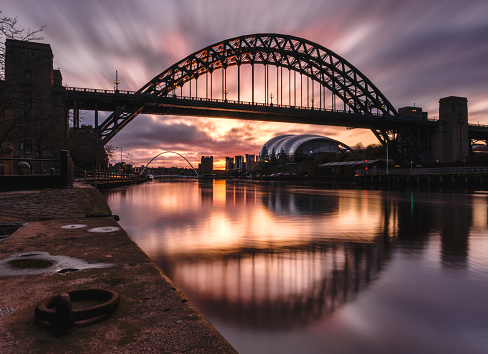 Tyne Bridge casts a lovely reflection at sunrise on a calm morning