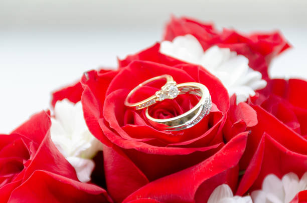 Wedding Rings on a rose bouquet