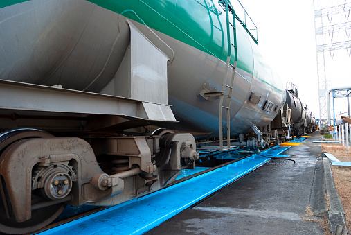 Close-up of rail transport of chemicals.