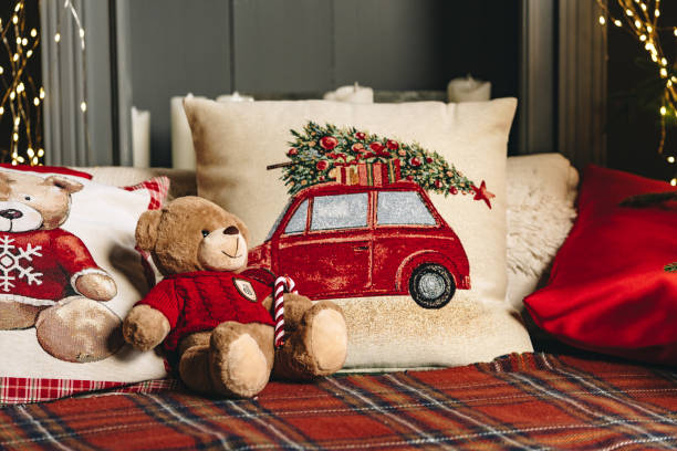 istock Teddy bear on bed with pillows for Christmas decoration 1817988686