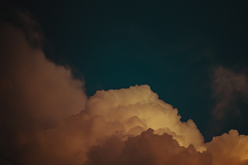 Cumulus Clouds and Dark Sky in the Background - Stock Photos