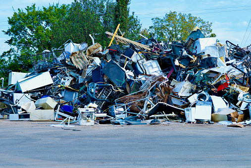 Lorton, Virginia, USA - October 15, 2021: Appliances, furniture and other large metal items are piled up at Fairfax County’s I-95 Landfill Complex.