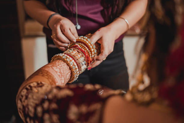 istock Preparing the bride for Indian wedding ceremony. 1818028830