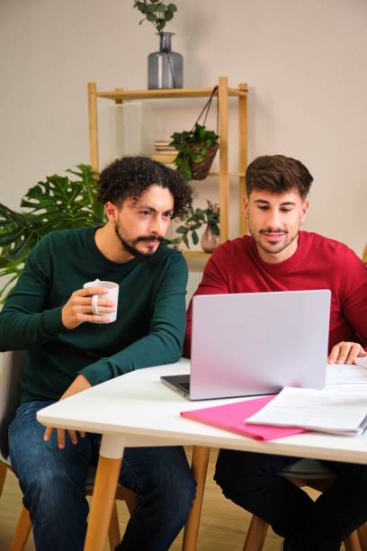 istock Two friends studying together at home. 1818036515