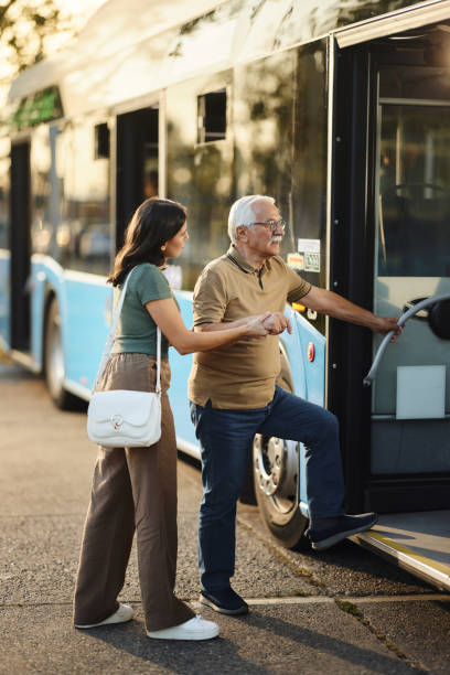 istock Let me help you to enter the bus! 1818060138