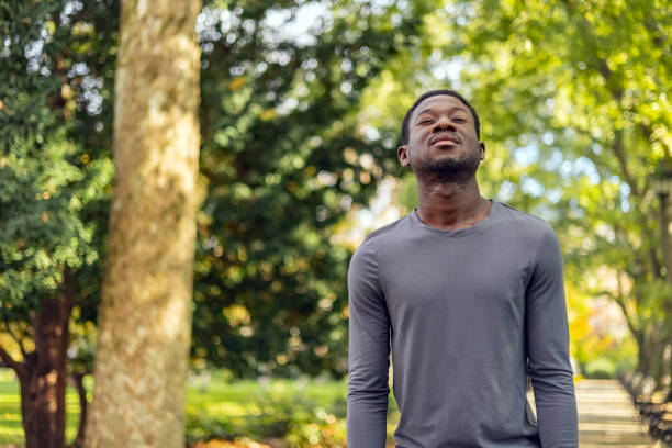 istock Relaxed man breathing fresh air outdoors. 1818076656