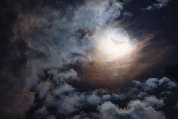 Full moon twilight with craters on the surface and dark sky, close up nature background
