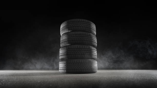 car tires set with a great profile on illuminates asphalt, smoke - street fog profile imagens e fotografias de stock