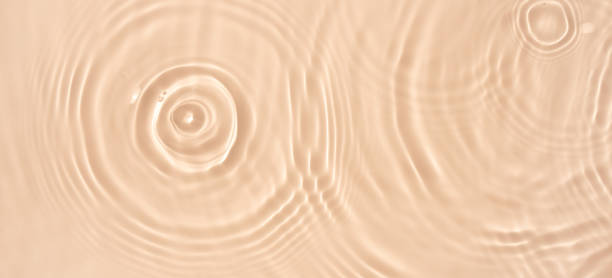 istock water texture ripples wave clean transparent water abstract background in beige color 1818103411