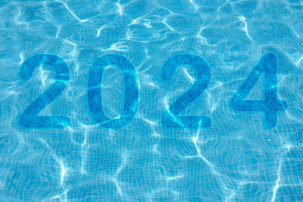 istock 2024, Number 2024 on orange background. Happy New Year 1818121733