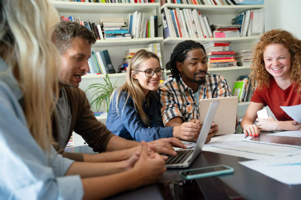 istock Business solutions, technology and strategy concept. Colleagues working and brainstorming in office 1818121781