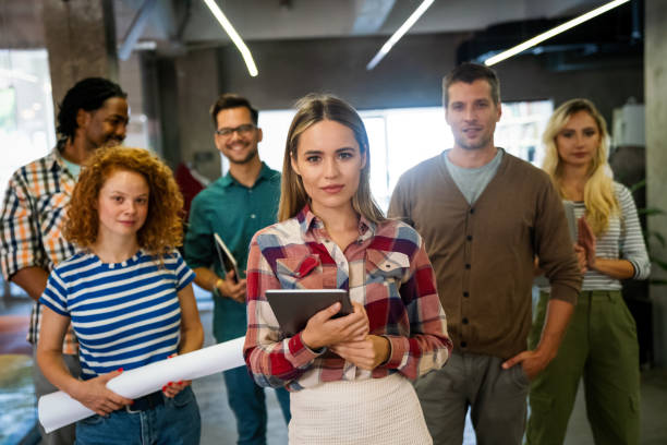 istock Business solutions, technology and strategy concept. Colleagues working and brainstorming in office 1818137730